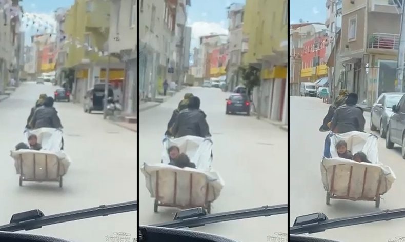 Motosiklete bağladıkları çekçek arabasıyla çocuklarını taşıdılar