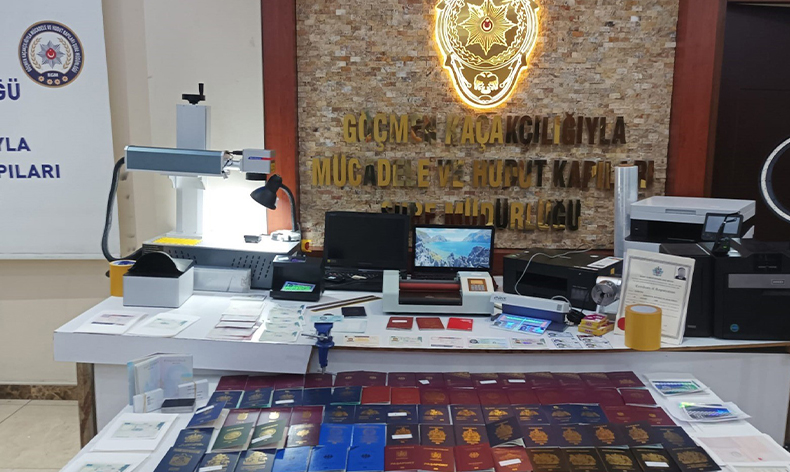 Sahte pasaport üreten şebekeye baskın