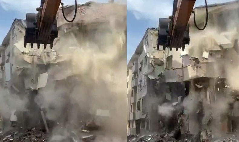 Ağır hasarlı bina korna sesi ile yıkıldı