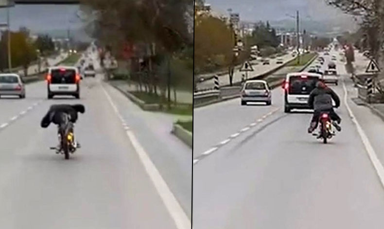 Motosikleti yatarak sürüp tehlike saçtı