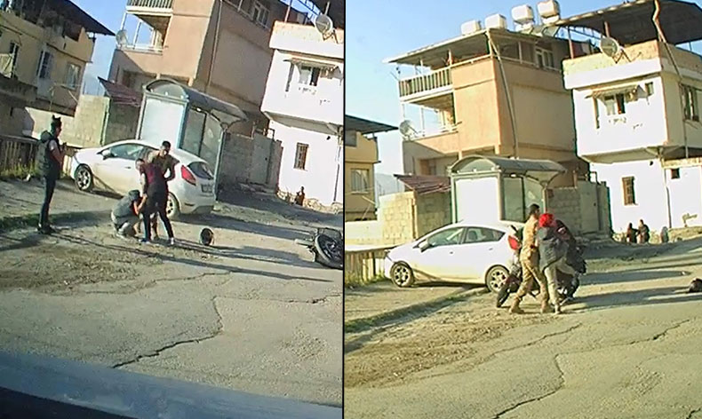 Kadın ile erkeğin kasklı ve tekmeli kavgası