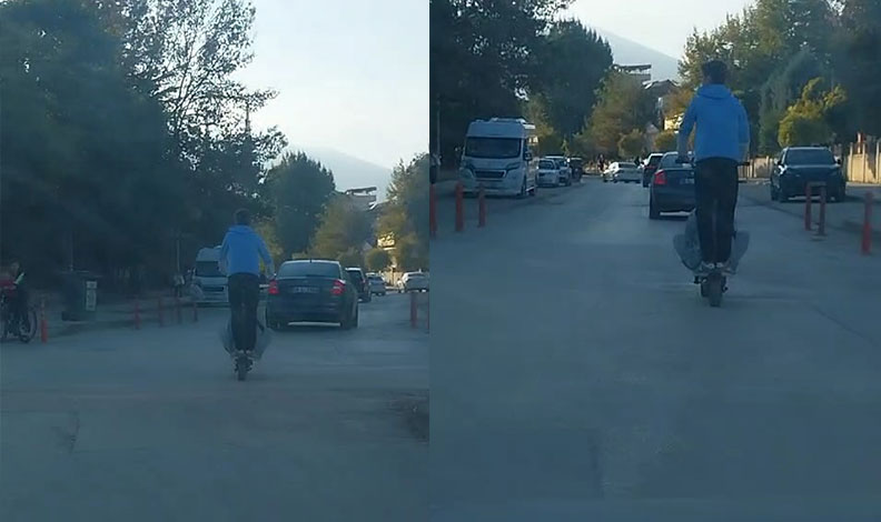 Scooter ile tehlikeli yolculuk kamerada